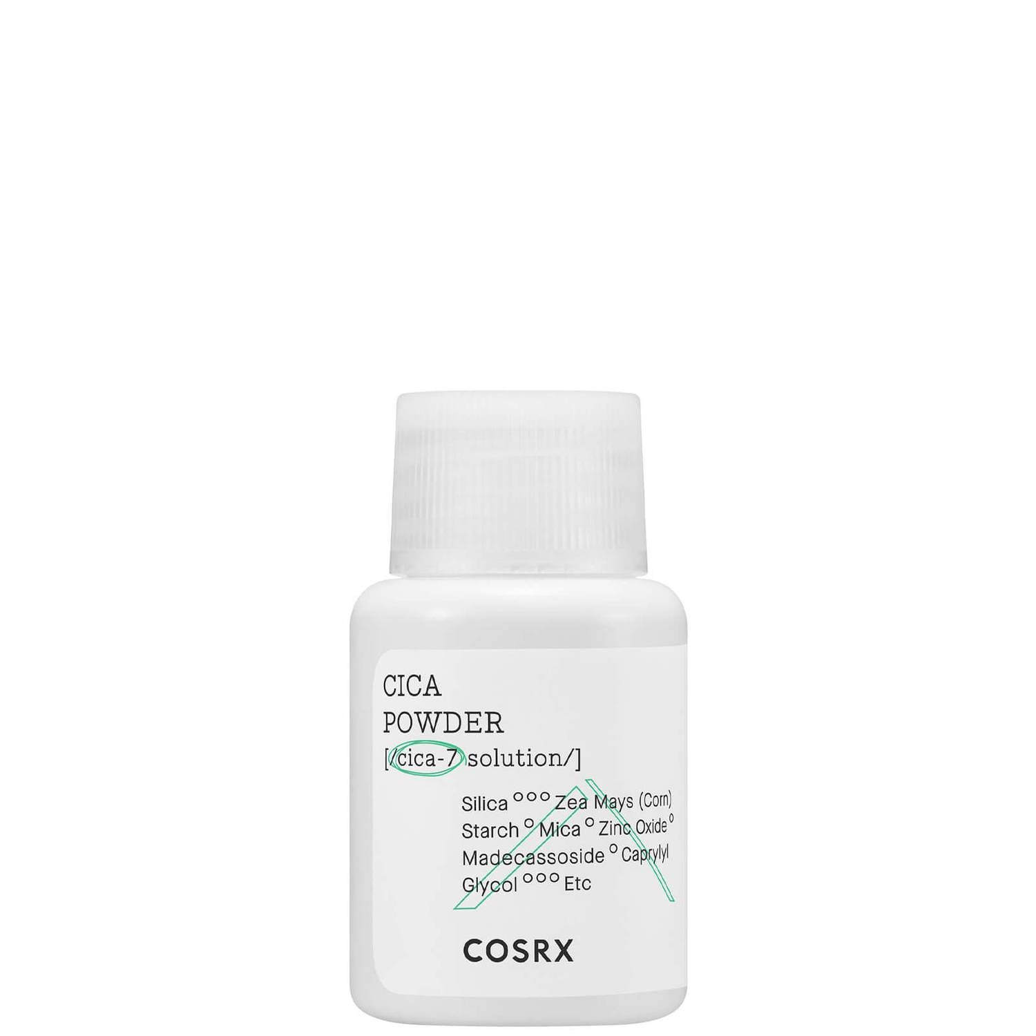 Cosrx Cica Powder 7G tube on a clean white surface, minimalist packaging with green and white label, powder texture visible on a cotton swab nearby