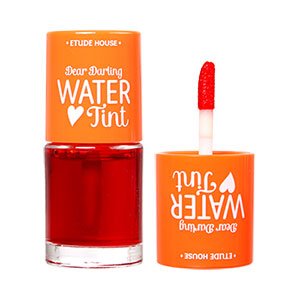 ETUDE Dear Darling Water Tint 9.5g #03 Orange Ade – slender transparent tube with orange liquid and silver cap against white background