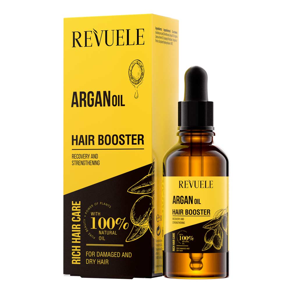 Revuele Argan Hair Booster 30ml bottle on a marble surface, showcasing the sleek packaging