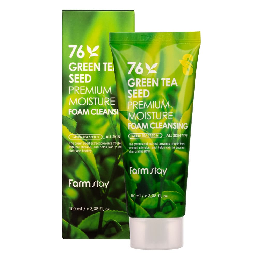 Hand applying Farmstay Green Tea Foam Cleanser to face in morning routine