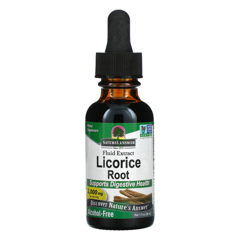 Close-up of amber liquid extract drops from licorice root supplement